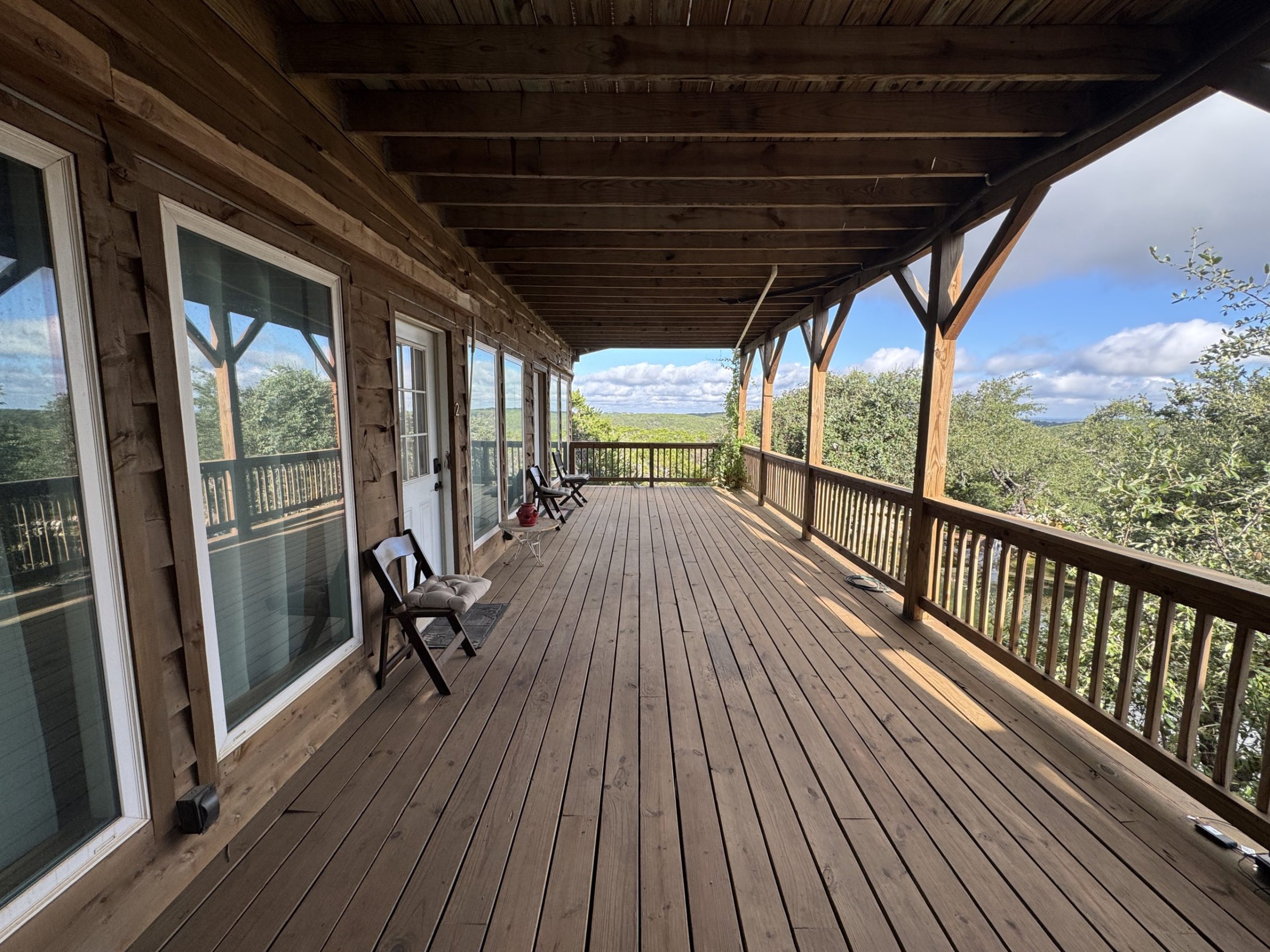 A covered wraparound deck at Heavenly View
