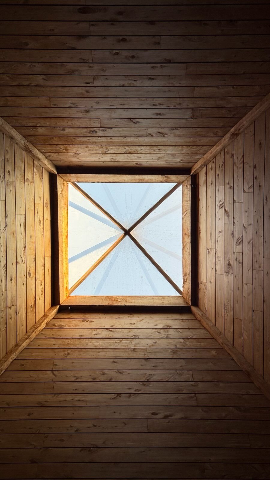 The pyramid skylight far overhead